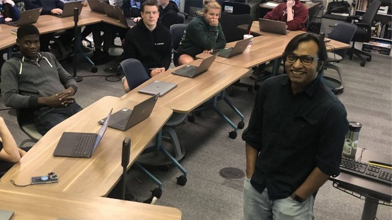Dr. Jyotishka Datta and Radford High School students in his data science class.