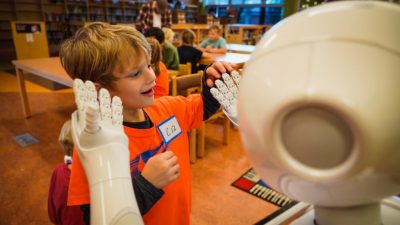 Children befriend robots in playful after-school research program